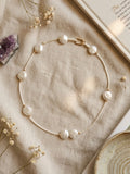 Luminous Coin Pearl Station Necklace on Cream Cord with Gold Accents