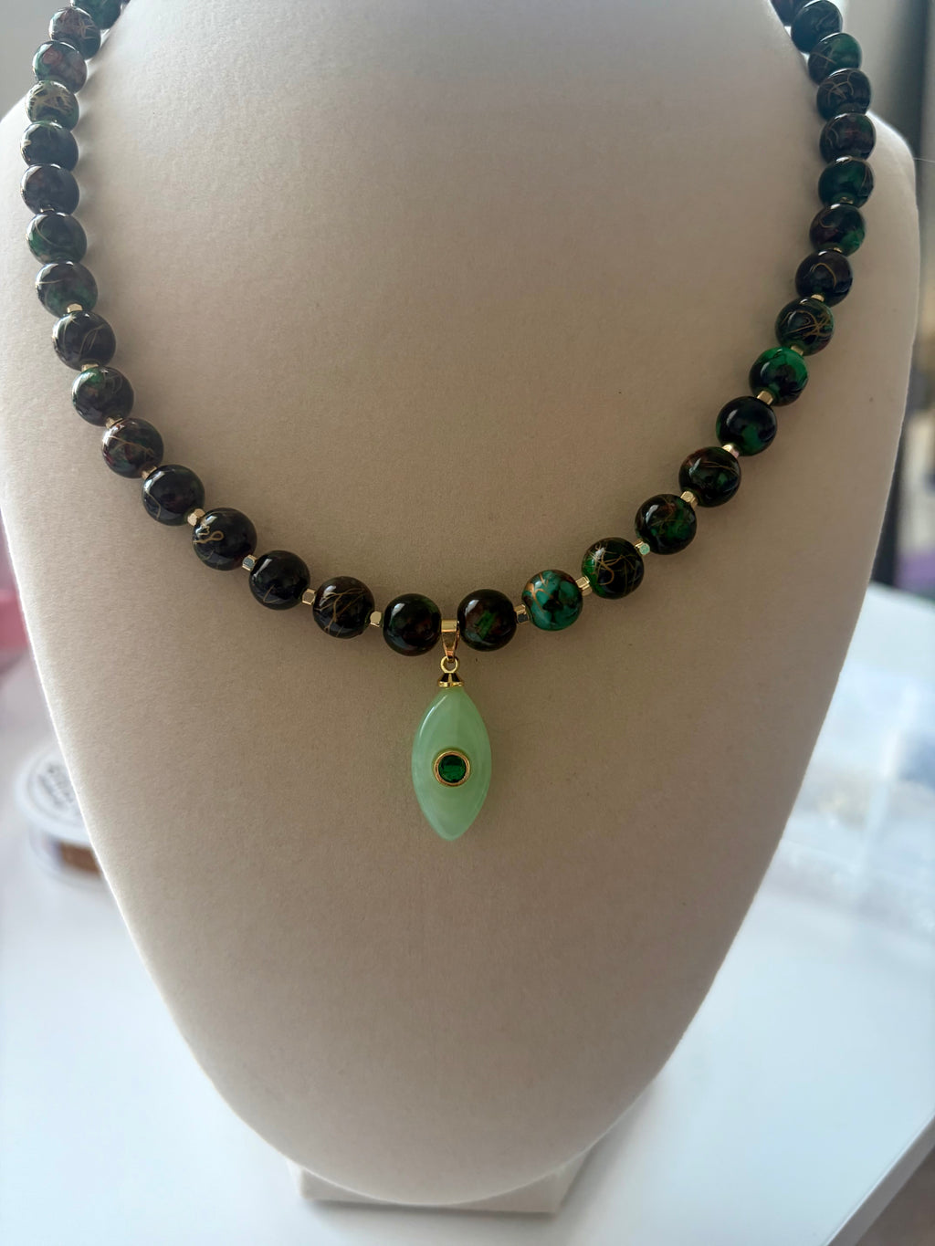 Natural Obsidian Jasper Strand with Light Green Marquise Charm